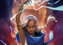 Storm using her powers in front of a building.