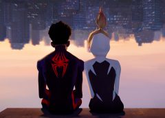 Miles Morales and Gwen Stacy sitting side by side
